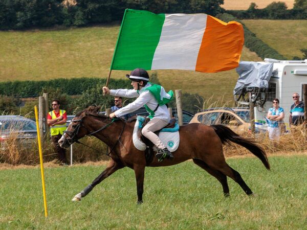 A race to the finish line during the pony games at the Tinahely Show A race to the finish line during the pony games at the Tinahely Show