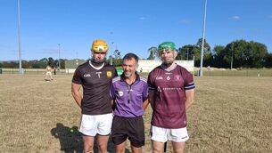 <p>Naomh Eoin captain, Brian Tracey, referee, David Hickey, and Naomh Bríd captain Fiach O'Toole. </p> <p>Naomh Eoin captain, Brian Tracey, referee, David Hickey, and Naomh Bríd captain Fiach O'Toole. </p>