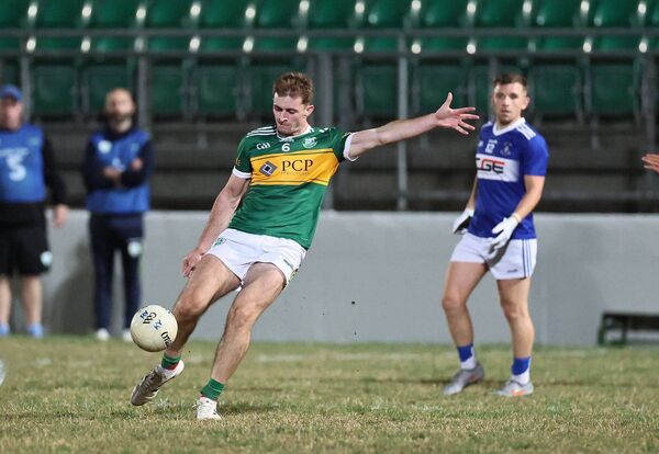 Dara Curran kicks a fine point for Rathvilly during their big win over Old Leighlin Photo: Pat Ahern