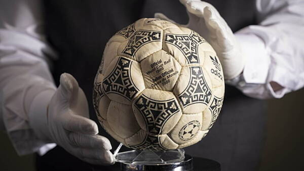 Maradona’s ‘Hand of God’ football sold at auction
