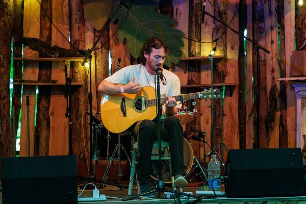 Kit James performing on the main stage in Lisnavagh woods Kit James performing on the main stage in Lisnavagh woods