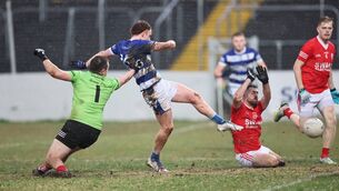 <p>Tinryland's Conor O'Toole slides the ball to the Éire Óg net with Mark Daly and Niall Swan beaten.</p> <p>Tinryland's Conor O'Toole slides the ball to the Éire Óg net with Mark Daly and Niall Swan beaten.</p>