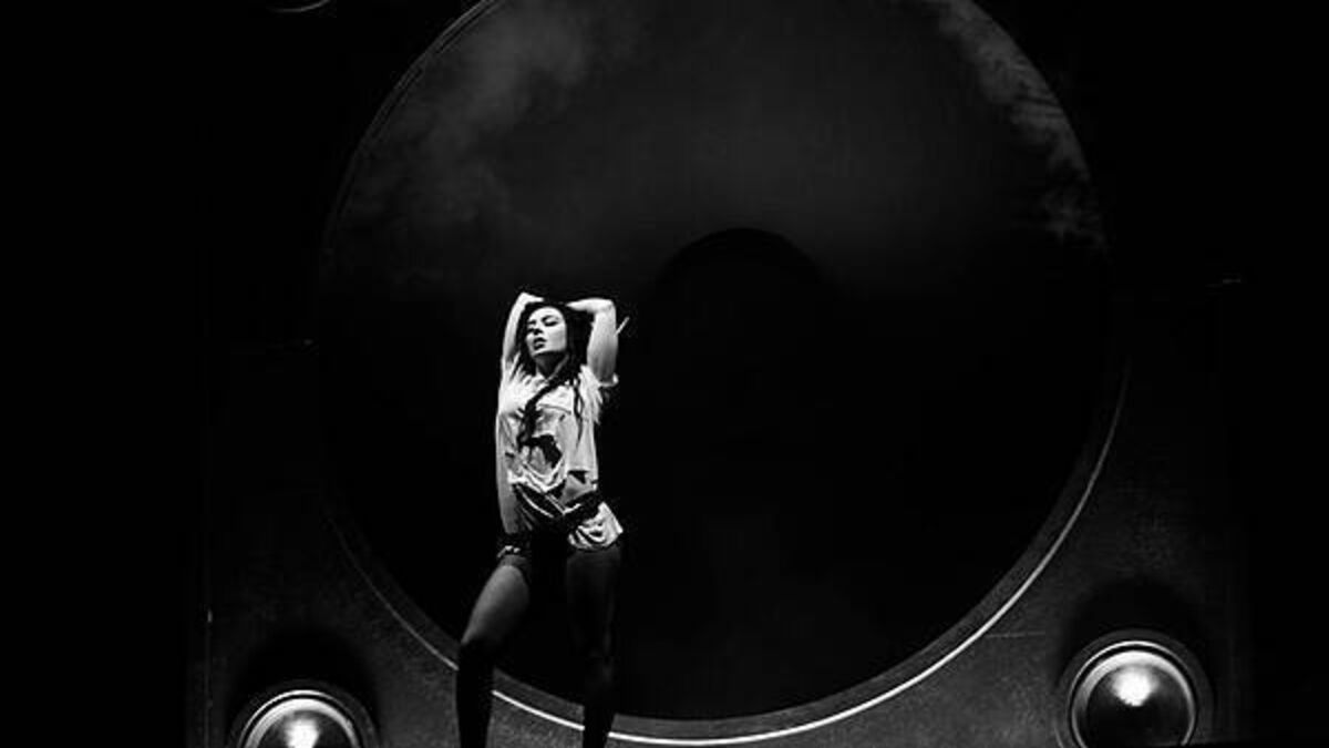 Heavy rain subsides as Charli XCX takes to stage at Reading Festival