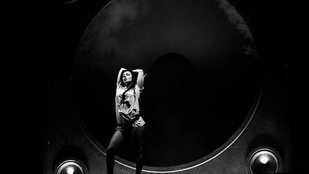 Heavy rain subsides as Charli XCX takes to stage at Reading Festival