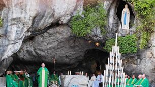 <p>Fr John Dunphy, PP of Graiguecullen/Killeshin, celebrates Mass at Lourdes grotto Photo: John J Bradley </p>