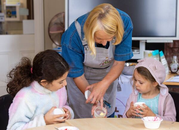 Deirdre Doyle from Cool Food School with Jana and Joya during a butter and jam making workshop in the Carlow Library as part of Heritage Week