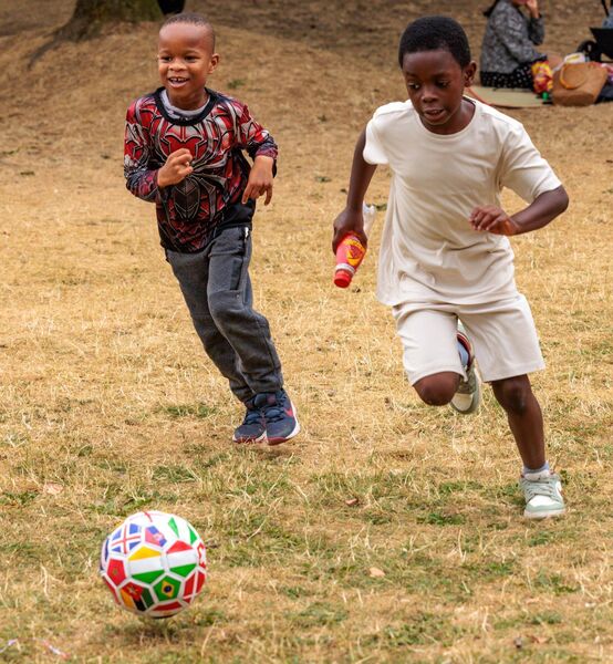 Children playing soccer at the funday