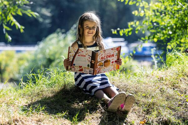 Molly Loughman reads one of the many books around Graignamanagh during the Town of Books Festival Molly Loughman reads one of the many books around Graignamanagh during the Town of Books Festival