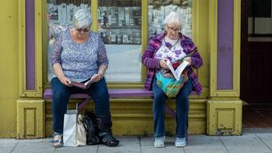 <p>Niamh Conaghan and Betty Payne dip into their new books at the festival </p>