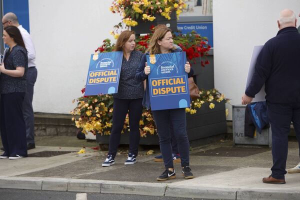 Striking staff members outside Tullow Credit Union. Photo: FSU. Striking staff members outside Tullow Credit Union. Photo: FSU.