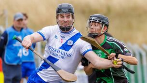 <p>Conor Lawlor (Carlow Town) takes on Danny Travers (Bagenalstown Gaels)</p> <p>Conor Lawlor (Carlow Town) takes on Danny Travers (Bagenalstown Gaels)</p>