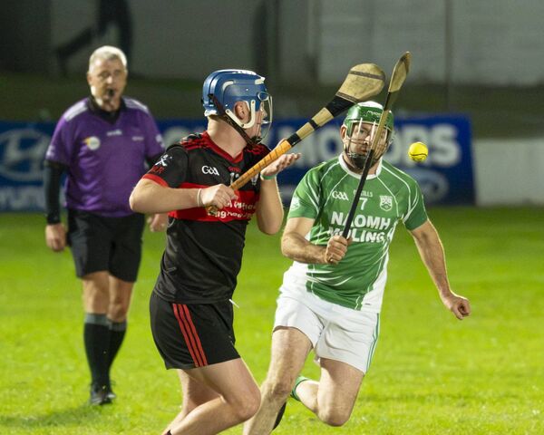 Mount Leinster Rangers Ciaran Kavanagh gets his shot off before Noamh Molings Andy Corcoran can make he block in the Junior Hurling Championship Semi Final- Netwatch Cullen Park. Mount Leinster Rangers Ciaran Kavanagh gets his shot off before Noamh Molings Andy Corcoran can make he block in the Junior Hurling Championship Semi Final- Netwatch Cullen Park.