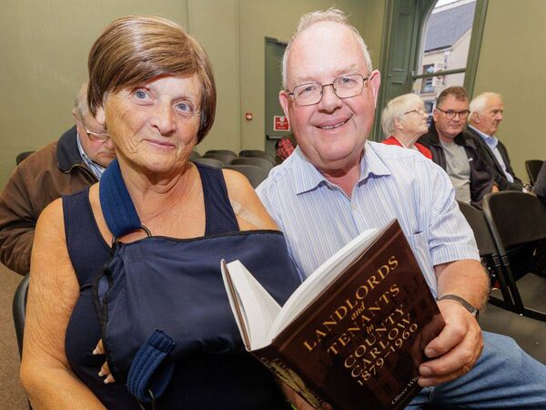Celine and Padraig Dooley take a quick look through Oliver's book