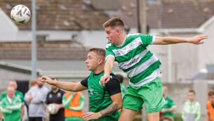 <p>New Oak’s David O’Shea beats Hanover Harps' Liam Ryan and powerfully heads clear for his team. Photo: Michael O'Rourke </p> <p>New Oak’s David O’Shea beats Hanover Harps' Liam Ryan and powerfully heads clear for his team. Photo: Michael O'Rourke </p>