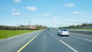 <p>Rear view of cars driving on motorway, Ireland. Road with metal safety barrier or rail. cars on the asphalt under the cloudy blue sky. Highway traffic.</p> <p>Rear view of cars driving on motorway, Ireland. Road with metal safety barrier or rail. cars on the asphalt under the cloudy blue sky. Highway traffic.</p>