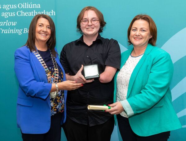 Joseph Hickey from Colaiste Aindriu receives his award from cllr Andrea Dalton. Also shown is principal Sarah Kennedy Joseph Hickey from Colaiste Aindriu receives his award from cllr Andrea Dalton. Also shown is principal Sarah Kennedy