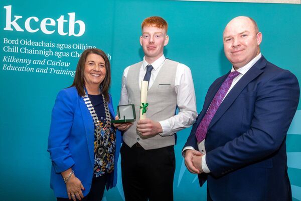 Mark Kinsella from Coláste Eoin receives his award from cllr Andrea Dalton awards ceremony in the Woodford Dolmen Hotel. Also shown is principal Alan Costello Mark Kinsella from Coláste Eoin receives his award from cllr Andrea Dalton awards ceremony in the Woodford Dolmen Hotel. Also shown is principal Alan Costello