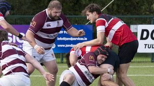 <p>Tullow hooker Corey Leigh Hughes delivers a crunching tackle to bring the Wicklow attack to a halt. Photos: Aisling Hyland.</p> <p>Tullow hooker Corey Leigh Hughes delivers a crunching tackle to bring the Wicklow attack to a halt. Photos: Aisling Hyland.</p>