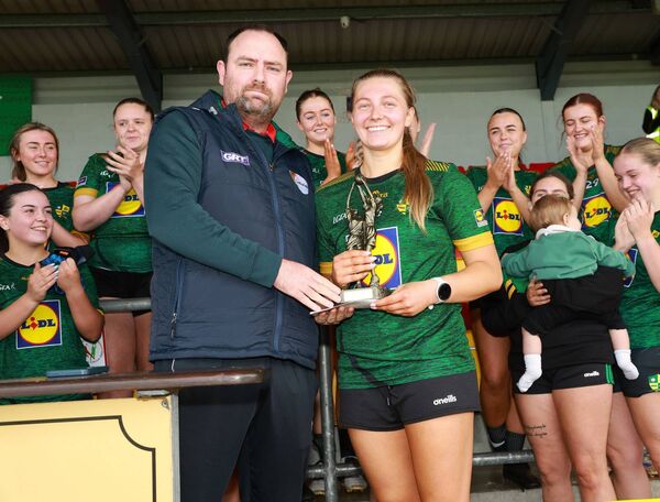 Eve Sinnott from St Andrew's accepts the 'Player of the Match' from Carlow Ladies Football Manager, Ed Burke.