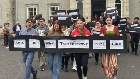 College staff and students stage demonstration
