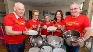 <p>Fr John Dunphy (left) and Isobel Brooker (centre board of management) with David Walsh, Jacqui McNabb and Rachel Doyle, Friends of St Clare’s Hospitality Kitchen Photo: © Michael O'Rourke Photography 2026</p>