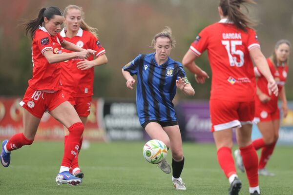  Aoife Kelly closes in to make a tackle on Athlon Town's Hannah Waesch during the President Cup Final last March Photo: ©INPHO/Bryan Keane