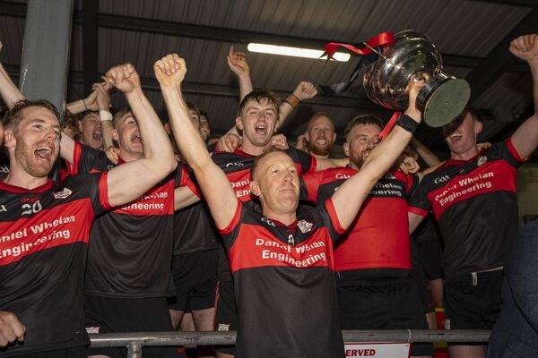 Mount Leinster Rangers captain Richard Coady lifts the Willie O'Connor Cup Photo: ©INPHO/James Lawlor