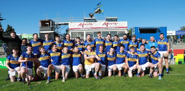 Ballinkillen captain John Farrell throws up the JHC trophy in the air in celebration Photo: Pat Ahern Ballinkillen captain John Farrell throws up the JHC trophy in the air in celebration Photo: Pat Ahern