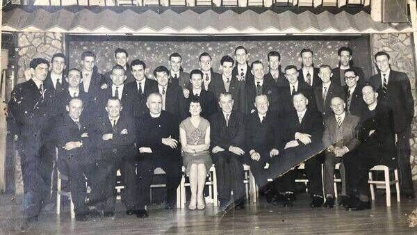 Margaret, surrounded by her male colleagues, is pictured at celebration to mark The Nationalist's 75th anniversary held in The Crofton Hotel, now The Seven Oaks, in 1958