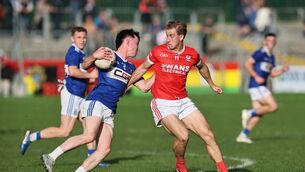 <p>Old Leighlin's Tadhg Roche cuts inside the tackle of Darragh O''Brien from Eire Og.</p> <p>Old Leighlin's Tadhg Roche cuts inside the tackle of Darragh O''Brien from Eire Og.</p>