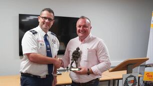 <p>Acting Chief Fire Officer Ben Woodhouse makes a presentation to Aiden Owens</p> <p>Acting Chief Fire Officer Ben Woodhouse makes a presentation to Aiden Owens</p>