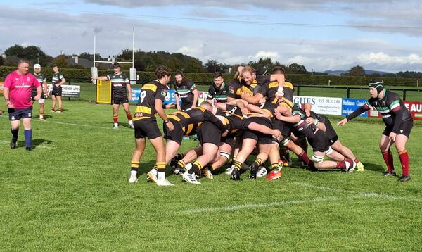 The Carlow pack maul their way to the De La Salle try line early in the game. The Carlow pack maul their way to the De La Salle try line early in the game.