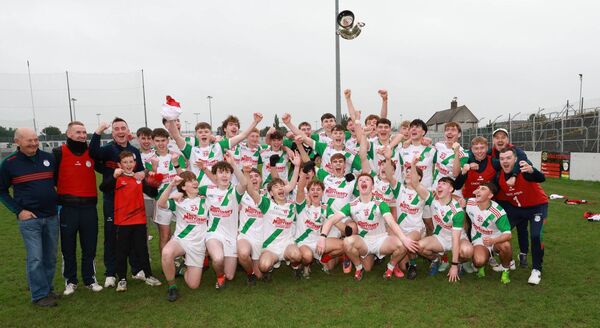 The Palatine minor football team and management show their delight after winning the minor football championship 