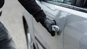 <p>Stock image of gloved hand on car via Istock</p>