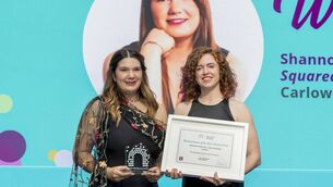 <p>Leighlinbridge woman, Shannon Kearney from SquaredMap receiving her award for Emerging Businesswoman from Sarah Walker, Enterprise Ireland Photo: Patrick Browne</p>