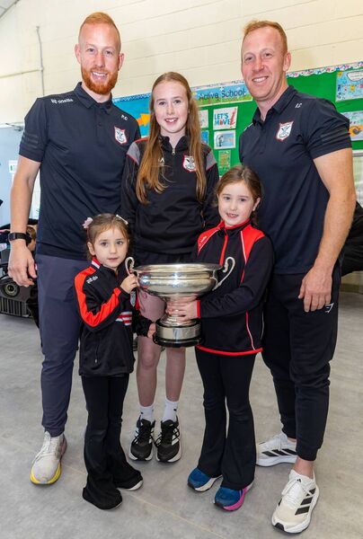 Paul and Richard Coady, pictured with cousins Robyn, Charlotte and Aoibhinn Coady when they brought the Senior County Hurling Trophy to Borris NS Paul and Richard Coady, pictured with cousins Robyn, Charlotte and Aoibhinn Coady when they brought the Senior County Hurling Trophy to Borris NS