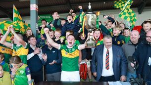 <p>Joyous Rathvilly captain Colin Byrne lifts The Nationalist Cup surrounded by young supporters. Photo: Pat Ahern </p> <p>Joyous Rathvilly captain Colin Byrne lifts The Nationalist Cup surrounded by young supporters. Photo: Pat Ahern </p>