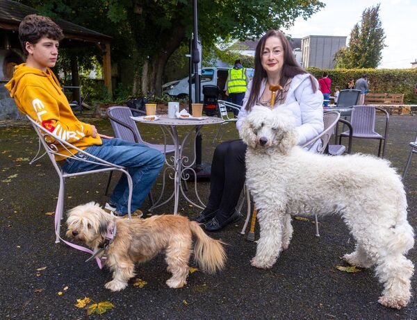 Pictured at the harvest festival were Alonso and Roxanne Byrne with her dogs Peppie and Misty Pictured at the harvest festival were Alonso and Roxanne Byrne with her dogs Peppie and Misty