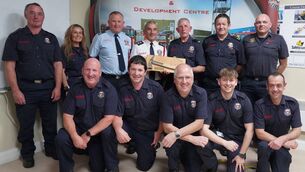 <p>Frankie, third right, back row with his colleagues from Hacketstown Fire Brigade. Back row: Brendan Cullen, Geraldine Strahan, Gerard Doyle sub officer, Eddie Coleman station officer, Francis Whelan, Tony Tallon and Dan Moorehead Front: Thomas Doyle, John Roche, Dennis Joyce, William Kenny and Colm Murphy</p> <p>Frankie, third right, back row with his colleagues from Hacketstown Fire Brigade. Back row: Brendan Cullen, Geraldine Strahan, Gerard Doyle sub officer, Eddie Coleman station officer, Francis Whelan, Tony Tallon and Dan Moorehead Front: Thomas Doyle, John Roche, Dennis Joyce, William Kenny and Colm Murphy</p>