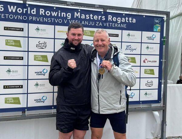 Carlow rower Niall O'Brien, along with his son Ross, celebrates winning Gold at the World Regatta Masters in Slovenia.