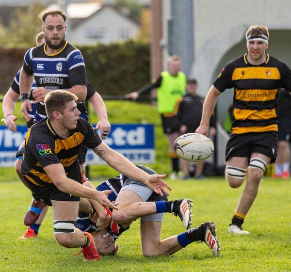 Carlow’s Cormac McElligott with a brilliant offload to create the opening try of the game from Owen Edghill.