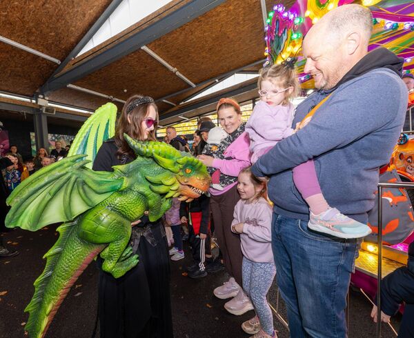 Members of the Roche family meet a fiery friend at the Dragon Experience in The Exchange, Carlow Photo: © Michael O'Rourke Photography 2026