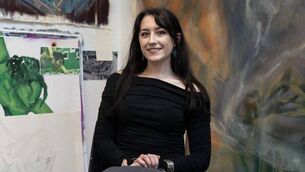 <p>Bennekerry artist Maeve Holmes with her art at the FLARE exhibition in New York last month </p> <p>Bennekerry artist Maeve Holmes with her art at the FLARE exhibition in New York last month </p>