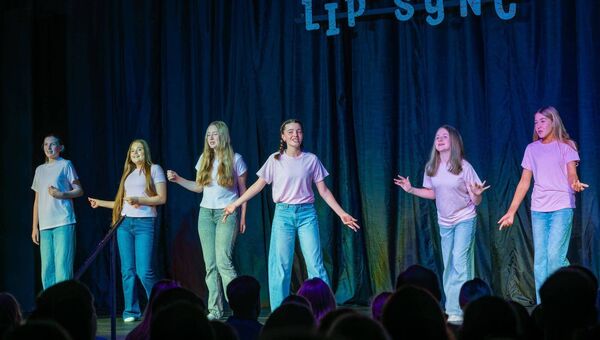 Kate Keogh, Emily Hickey, Nadine Foley, Madison Walsh, Jessica Browne, Olivia Shore and Kailyn Keogh having fun on stage